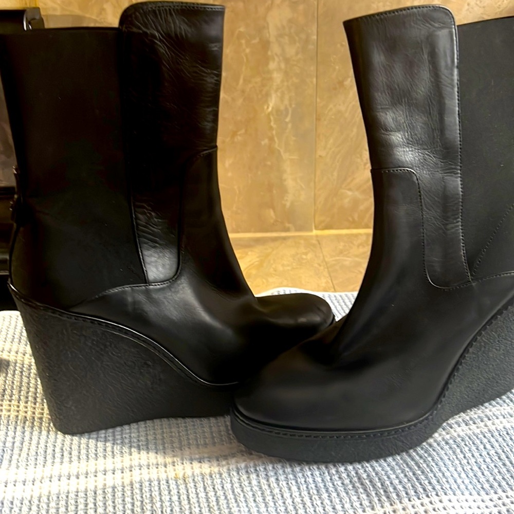 Moncler boots and good condition just a some very small scratches seen on pic.
